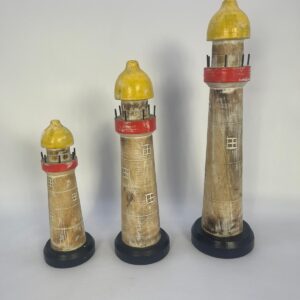 Set of carved three wooden lighthouses