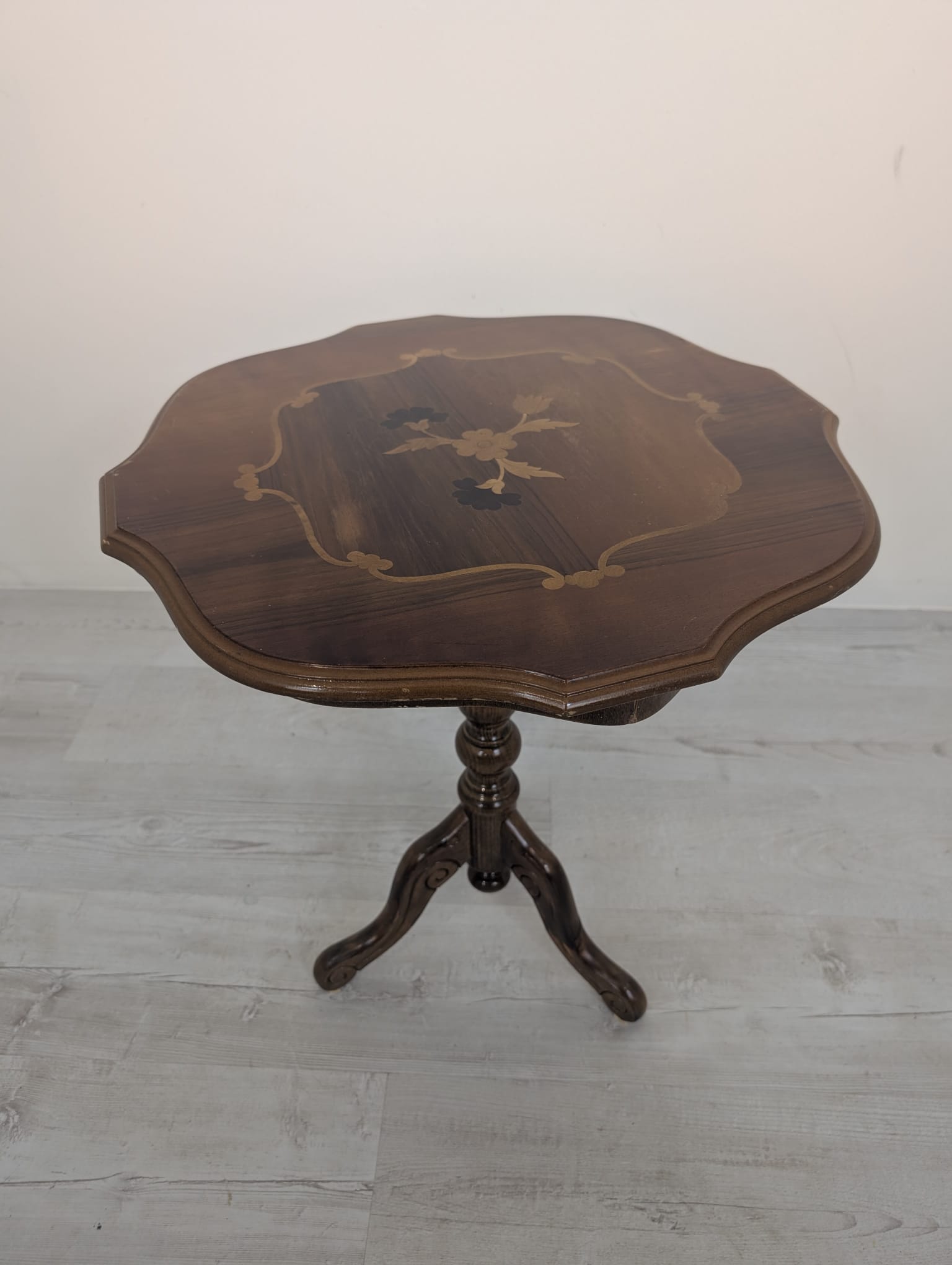 Round coffee table with inlaid top