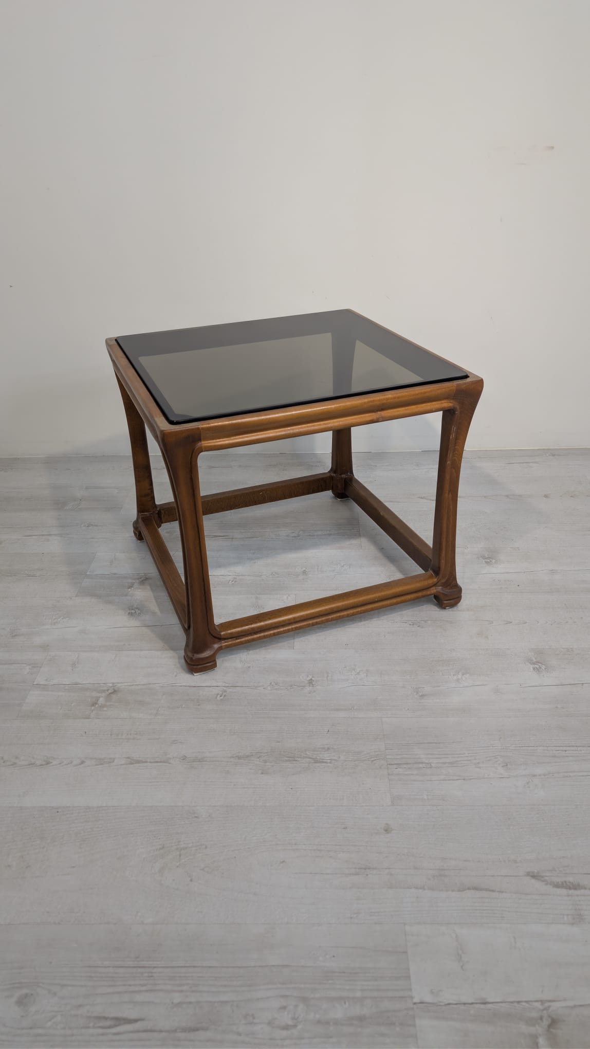 Coffee table made of solid teak wood with smoked glass from the 1960s/1970s