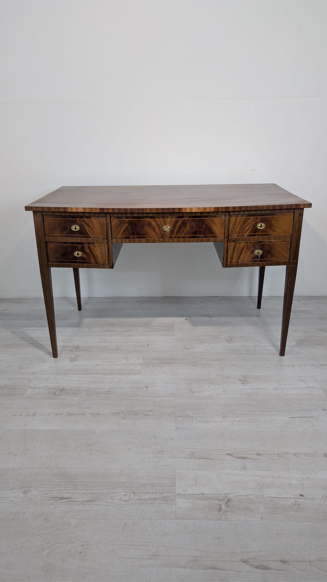 Old English-style mahogany desk with inlay work