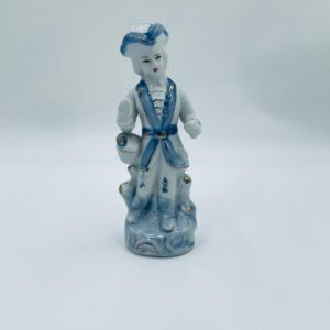 Vintage porcelain collector's figurine