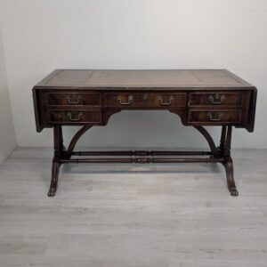 Antique English Chesterfield style mahogany desk from 1900