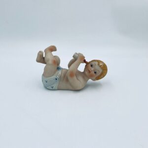Piano Baby porcelain collector's figurine