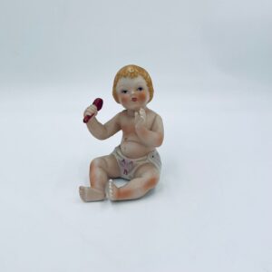 Piano Baby porcelain collector's figurine