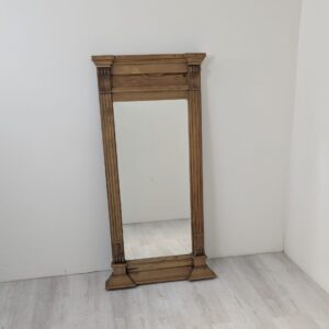 Antique mirror in wooden pine frame in rustic style