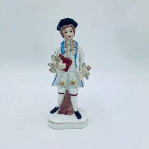 Vintage porcelain collector's figurine