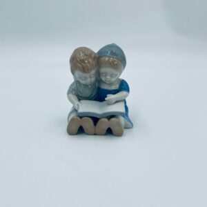 Vintage porcelain collector's figurine