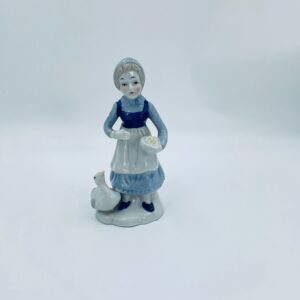 Vintage porcelain collector's figurine