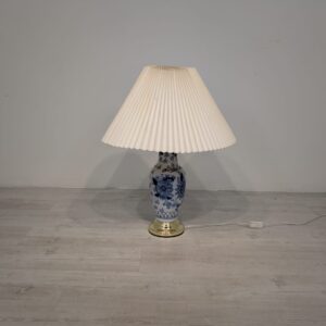 Vintage style porcelain lamp with blue flowers