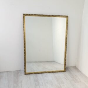 Chamfered wall mirror in wooden gilt frame