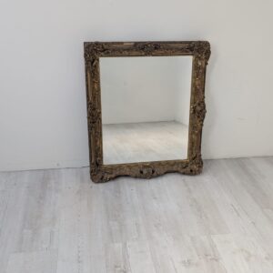 Bauhaus-style wall mirror in gilded frame