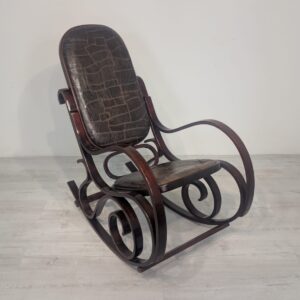 Designer rocking chair with natural brown leather