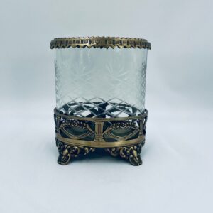 Decorative brass candle holder with crystal cylinder